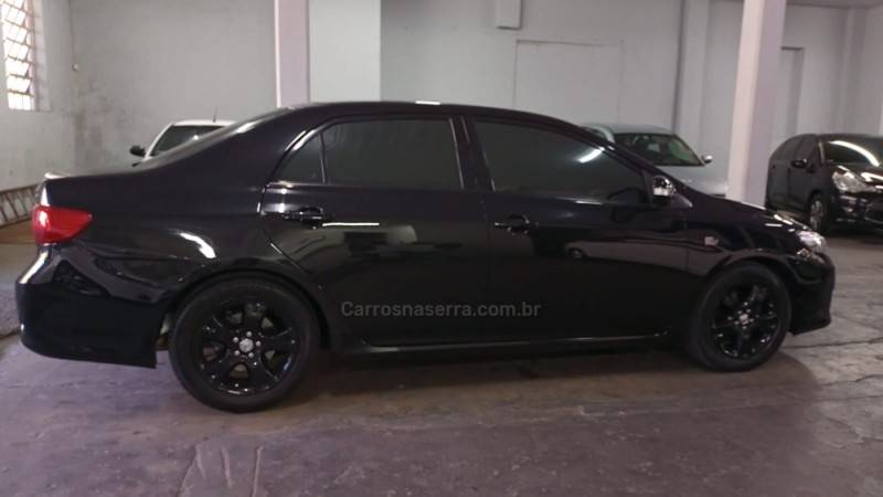 TOYOTA - COROLLA - 2010/2011 - Preta - R$ 57.000,00