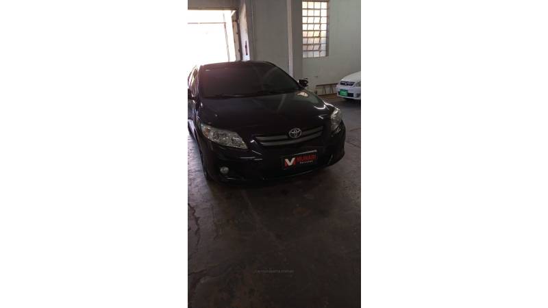 TOYOTA - COROLLA - 2010/2011 - Preta - R$ 57.000,00